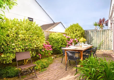 The patio, alfresco dining area & enclosed garden at Pendragon, Padstow