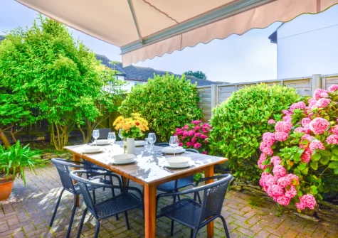 The patio, alfresco dining area & enclosed garden at Pendragon, Padstow