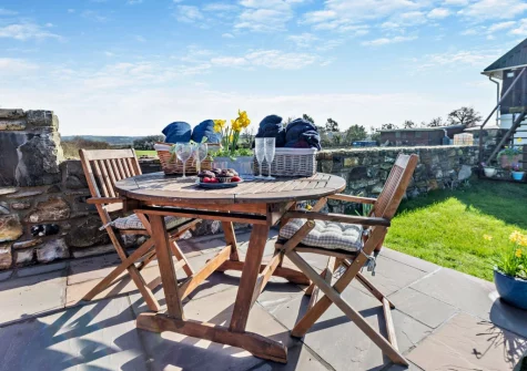 The patio, alfresco dining area & enclosed garden at Penhill Tack Room, Fremington