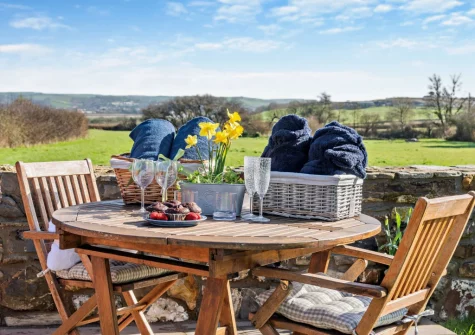 The patio, barbecue & alfresco dining area at Penhill Tack Room, Fremington