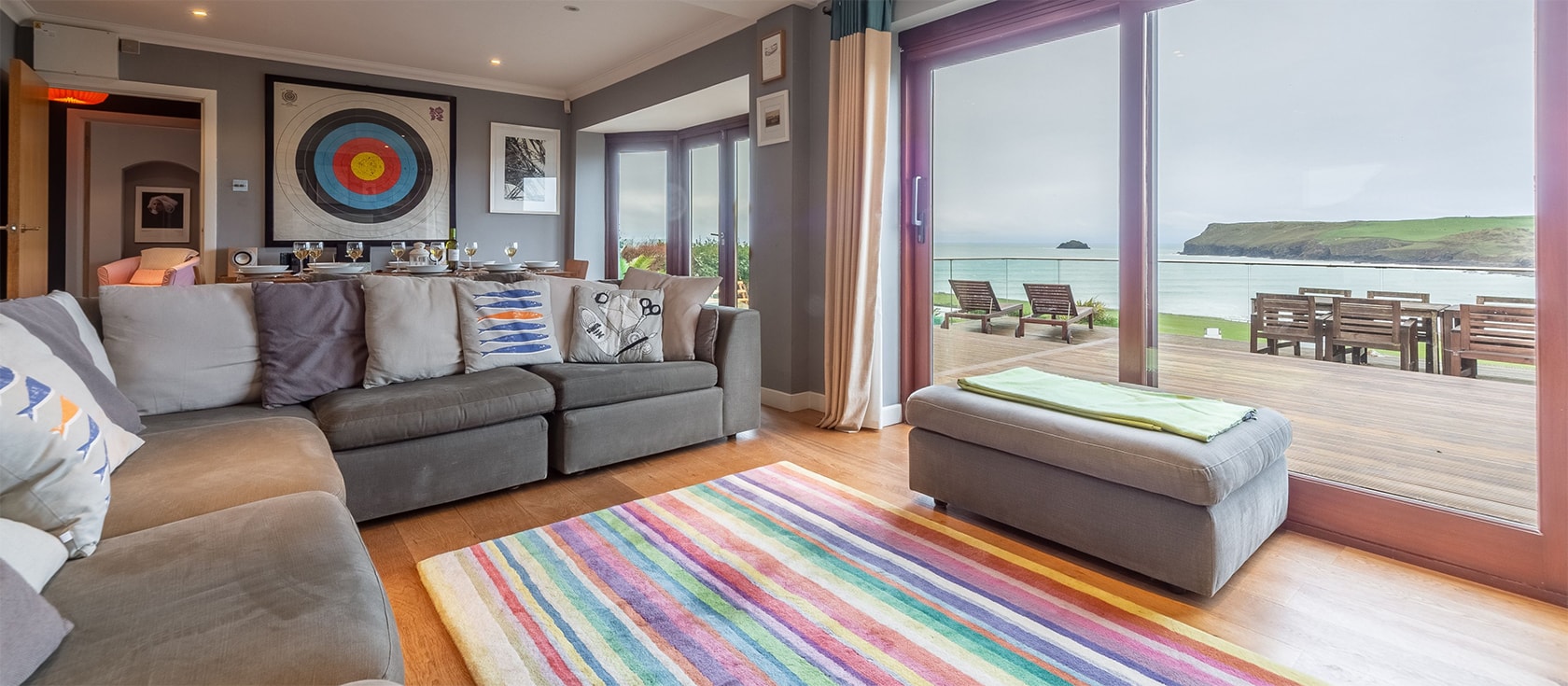 It's all about the view at Pentewan, Polzeath which is a stone's throw from the sand and surf with sea views from most rooms. Contemporary open-plan living room & kitchen with bifold doors onto the sun deck. Four bedrooms, three bathrooms & off-road parking.