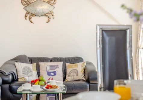 The living area at Penthouse at Lemain Garden Apartments, Looe