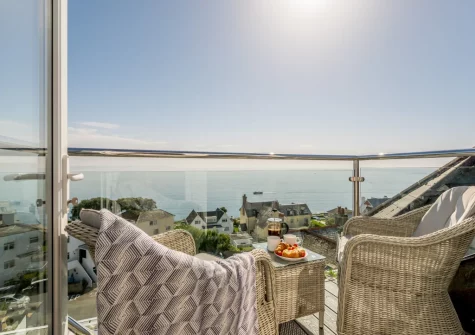 The balcony & outdoor sitting area at Penthouse at Lemain Garden Apartments, Looe