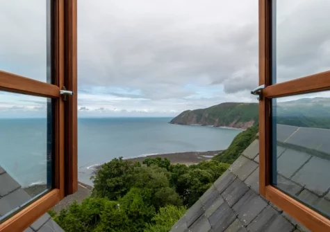 The coast & sea view from the living room at Penthouse Channel View, Lynton