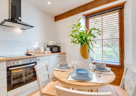 The kitchen & dining area at Penthouse Channel View, Lynton