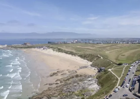 Newquay's iconic Fistral Beach is renowned for its world-class waves, expanse of golden sands & lively vibe