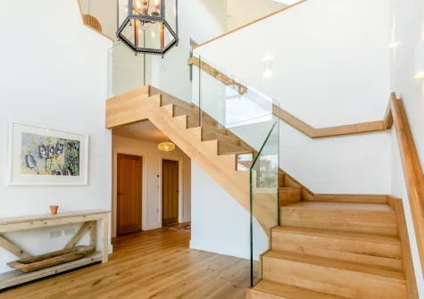 The entrance hallway & stairs up to the first floor at Pentire, Trevone