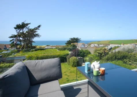 The the view from the top floor decked balcony & outdoor sitting area at Pentire, Trevone