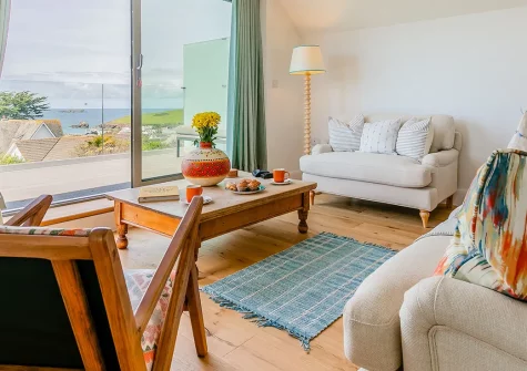 Pentire, Trevone is a stunning new build coastal retreat with breathtaking sea views over Trevone Bay. Enjoy contemporary styling, private balconies, enclosed gardens, and luxury amenities perfect for families seeking coastal elegance.