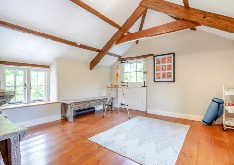 The yoga & art studio, with a doorway out to the garden, at Penvith Farmhouse, Saint Martin-by-Looe