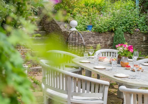 The patio & alfresco dining area at Penvith Farmhouse, Saint Martin-by-Looe