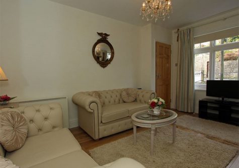 The living area at Petite Maison, The Coombes