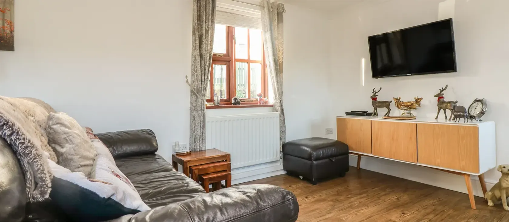 Phoenix Cottage, Hugus is a detached barn conversion in a peaceful rural location near Truro. This pet-friendly cottage stands on eight acres of private land and comes with a suntrap deck and private hot tub, perfect for a romantic escape.