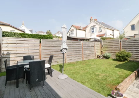 The decked patio & garden at Pier View, Paignton