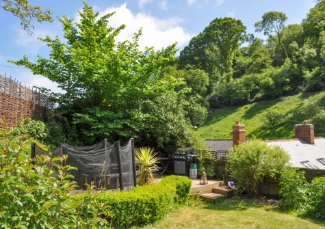 The decked patio, barbecue, alfresco dining area & garden at Pitt Cottage, Branscombe