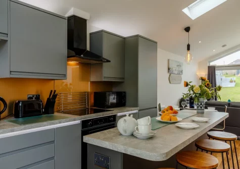 The kitchen at Plaice Two Two Be at Brixham Holiday Park, Brixham