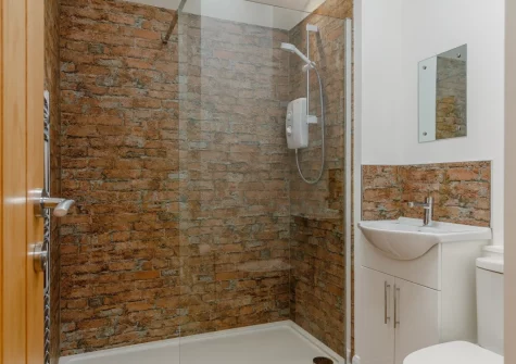 The shower room at Plaice Two Two Be at Brixham Holiday Park, Brixham