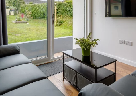 Plaice Two Two Be at Brixham Holiday Park is a beautifully presented detached lodge with sea glimpses from the patio, access to a heated indoor pool, and Fishcombe Cove's quiet beach just moments from your door on the stunning English Riviera.