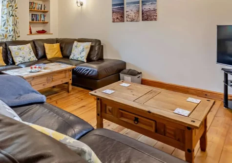 Ploughmans Retreat, Kilkhampton is a spacious barn conversion offering six bedrooms and two lounge areas, set in picturesque countryside with ponies on-site. Perfect for family gatherings, this rural haven provides easy access to Cornwall's beaches.