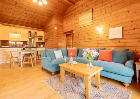 The living area at Plover Lodge 13 at Clovelly Lakes, Higher Clovelly