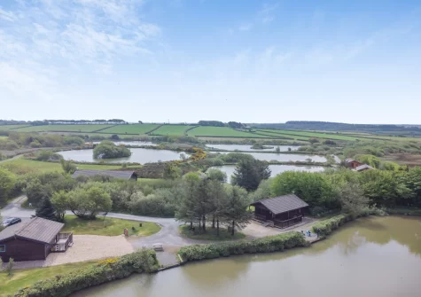 Plover Lodge 13 at Clovelly Lakes is set in a tranquil, picture-perfect landscape, complete with a dedicated circular woodland trail for peaceful dog walks