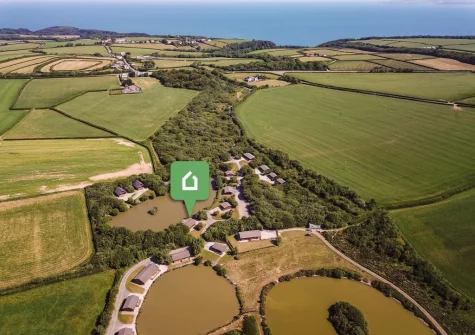 Plover Lodge 13 at Clovelly Lakes is set in a tranquil, picture-perfect landscape, complete with a dedicated circular woodland trail for peaceful dog walks