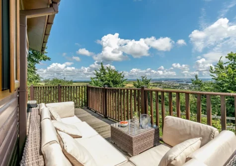 The decked patio & outdoor sitting area at Plymouth Sound View, Millbrook