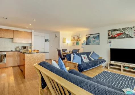 The living area & kitchen at Point Break, Westward Ho!