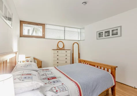 The bedroom at Point Break, Westward Ho!