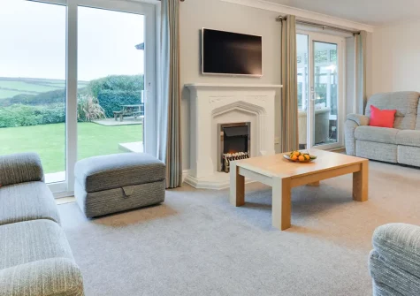Polbream, Trevone is a spacious, light-filled bungalow situated just half a mile from beautiful Trevone Bay. With four bedrooms, a games room, and an enclosed garden, it's the perfect family retreat on the stunning North Cornwall coast.