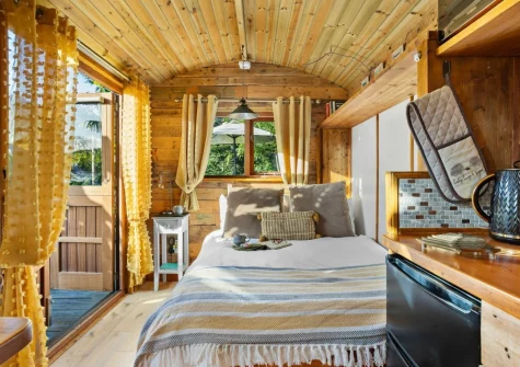 The sleeping area & kitchen at Poldhu at the Buryas Bridge Collection, Buryas Bridge