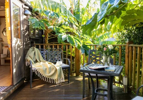 The decked terrace, alfresco dining & outdoor sitting area at Poldhu at the Buryas Bridge Collection, Buryas Bridge