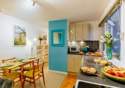 The kitchen & dining area at Polly's Place, St Ives