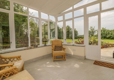 The conservatory at Polstein, Threemilestone