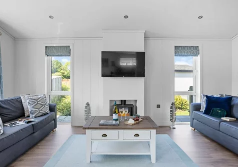 The living area at Poppy, 5 Roadford Lakes Lodges, Broadwoodwidger