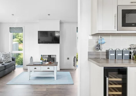 The living area & kitchen at Poppy, 5 Roadford Lakes Lodges, Broadwoodwidger