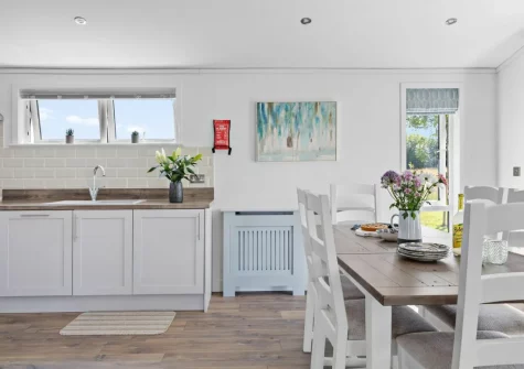 The kitchen & dining area at Poppy, 5 Roadford Lakes Lodges, Broadwoodwidger