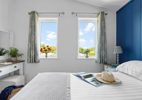 Bedroom #1 at Poppy, 5 Roadford Lakes Lodges, Broadwoodwidger