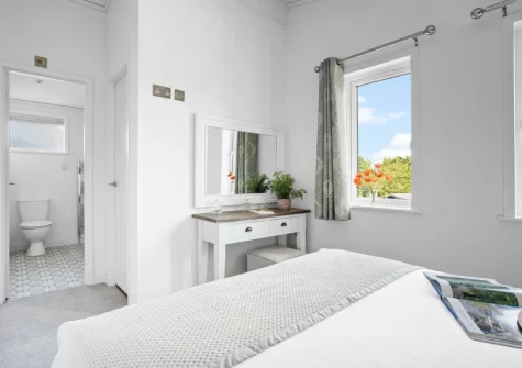 Bedroom #1 at Poppy, 5 Roadford Lakes Lodges, Broadwoodwidger