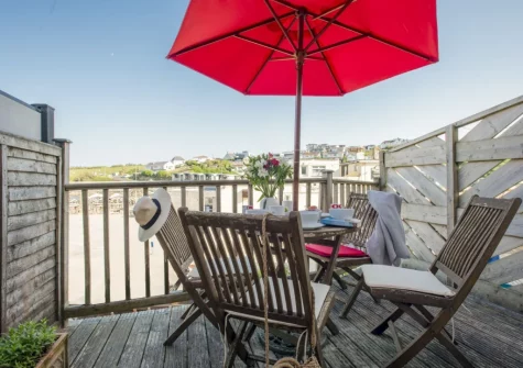 The balcony & outdoor sitting area at Porth Beach House at Mermaid Court, Newquay