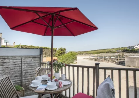 The view from the balcony & outdoor sitting area at Porth Beach House at Mermaid Court, Newquay