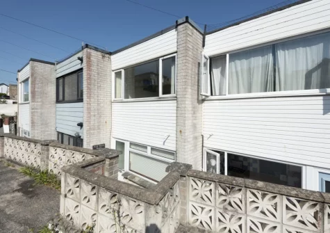 Porth Beach House at Mermaid Court is a refurbished family beach house with its own parking and sea view balcony just moments from the sands of Porth Beach