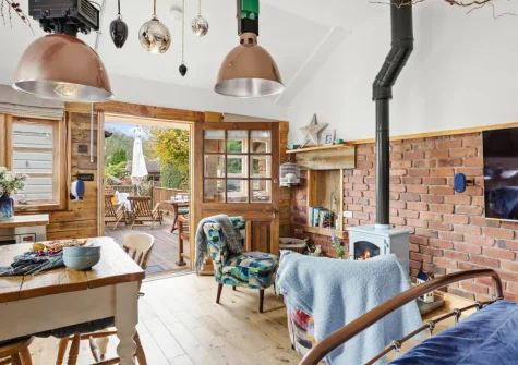 The living, dining & sleeping area at Porth Chapel at the Buryas Bridge Collection, Buryas Bridge
