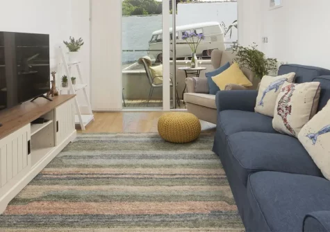 Porthminster Skies, St Ives is a stylish ground-floor apartment boasting breathtaking sea views and modern amenities. With two bedrooms, a stunning balcony, and easy access to golden beaches and cultural attractions, it's perfect for families.
