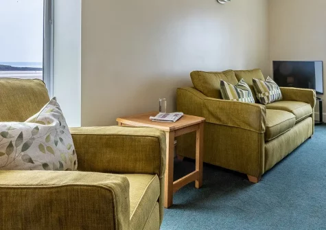 Portledge, Croyde is a charming first-floor apartment sleeping six, with private balcony views over Croyde beach. Perfect for families seeking water sports and the quintessential seaside holiday experience in one of the UK's favourite surf villages.