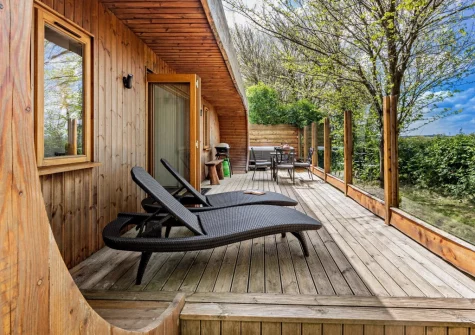 The decked patio, barbecue, alfresco dining & outdoor sitting area at Potbelly, Westward Ho!