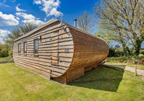 Potbelly is a unique & quirky lodge style property, contemporarily styled throughout with a private decked patio &  hot tub