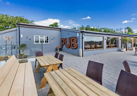 Award winning The Pig on the Hill pub is on site with eat-in and takeaway service