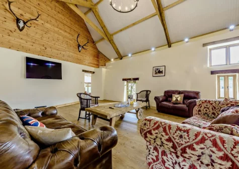 The living room at Priestacott Tithe Barn, Torrington