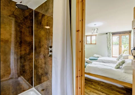Bedroom #3 & en-suite shower room at Priestacott Tithe Barn, Torrington